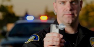 cop with breathalyzer